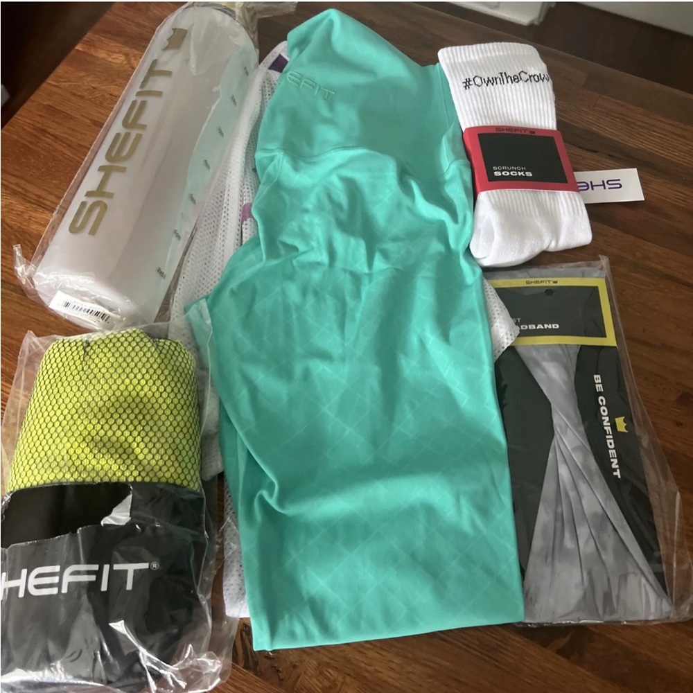 new shefit legging set with socks, headband, water bottle, and gym towel size xs